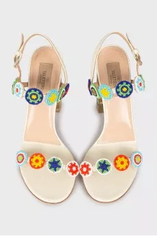 Leather sandals with appliqué