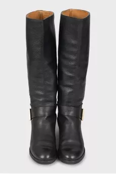 Black leather boots with buckle