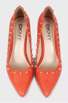 Leather shoes decorated with spikes