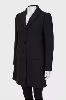 Coat decorated with bows