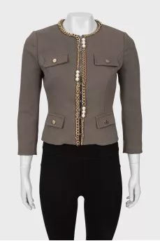 Jacket decorated with chain and beads