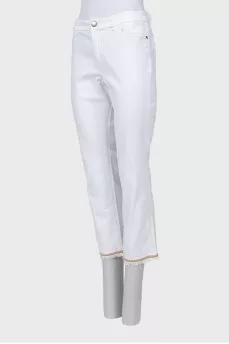 White jeans with hem decoration