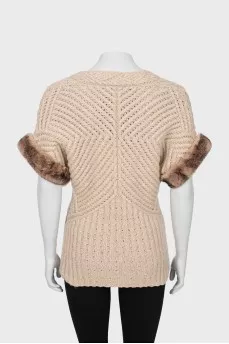 Cashmere sweater with fur sleeves