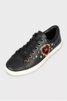 Black leather sneakers with decor