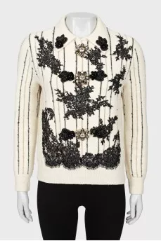 Decorated striped sweater
