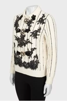 Decorated striped sweater