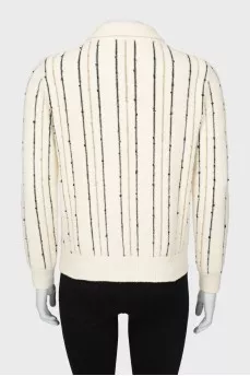 Decorated striped sweater