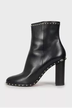 Leather ankle boots decorated with rhinestones