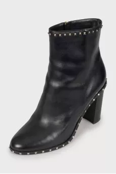 Leather ankle boots decorated with rhinestones
