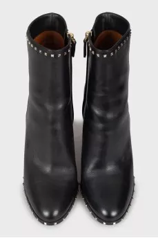 Leather ankle boots decorated with rhinestones