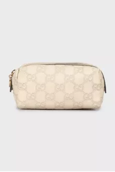 Leather cosmetic bag with branded embossing