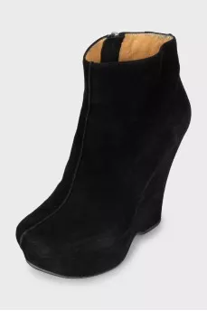 Suede ankle boots with shaped wedge