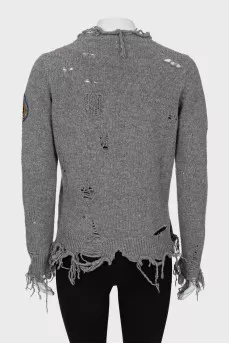 Ripped wool sweater