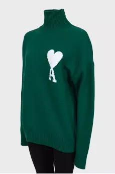 Knitted green wool sweater