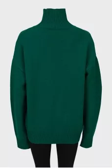 Knitted green wool sweater