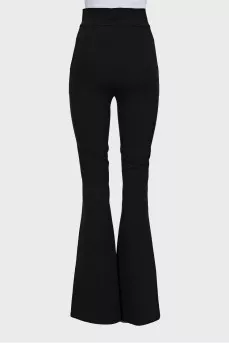 Flared trousers with slits at the bottom