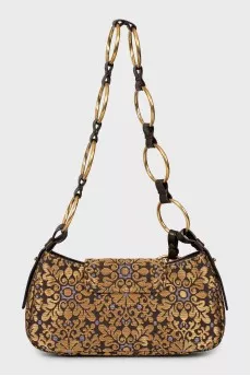 Textile bag with metal strap