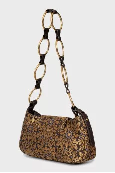 Textile bag with metal strap
