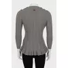 Knitted jumper with ruffled bottom