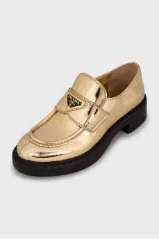 Gold leather loafers