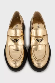 Gold leather loafers