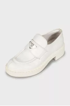 White leather loafers