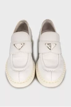 White leather loafers