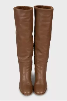 Insulated boots with wooden heels