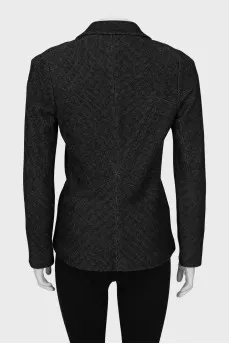 Jacket in small print with brooch