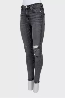 Skinny jeans with ripped effect