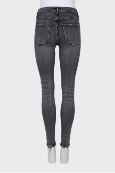 Skinny jeans with ripped effect