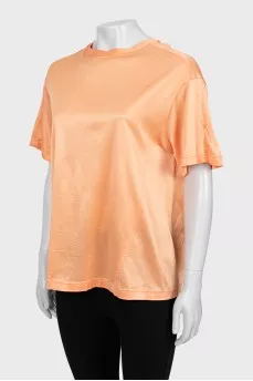 Orange T-shirt with raised seams