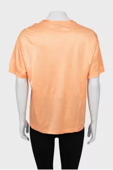 Orange T-shirt with raised seams