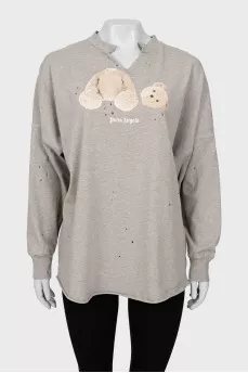 Long sleeve with torn effect