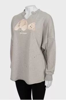 Long sleeve with torn effect