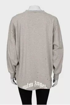 Long sleeve with torn effect