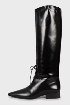 Leather boots decorated with laces
