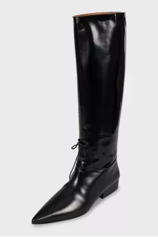 Leather boots decorated with laces