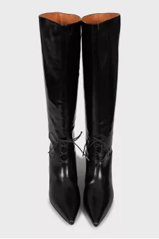 Leather boots decorated with laces