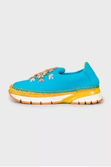Sneakers decorated with rhinestones