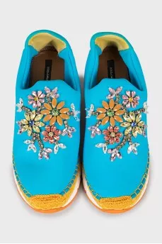 Sneakers decorated with rhinestones
