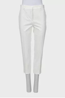 White trousers with stitched creases
