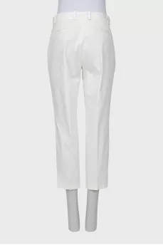 White trousers with stitched creases