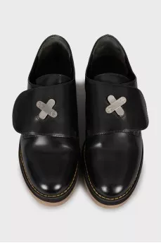 Black leather round toe pumps