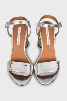 Silver sandals with decorative heels