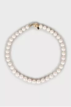 Gold mono earring and pearl necklace