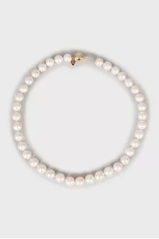 Gold mono earring and pearl necklace