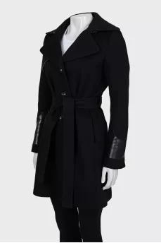 Fitted coat with leather inserts
