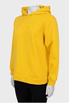 Yellow hoodie with embossed logo