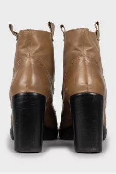 Perforated high heel ankle boots